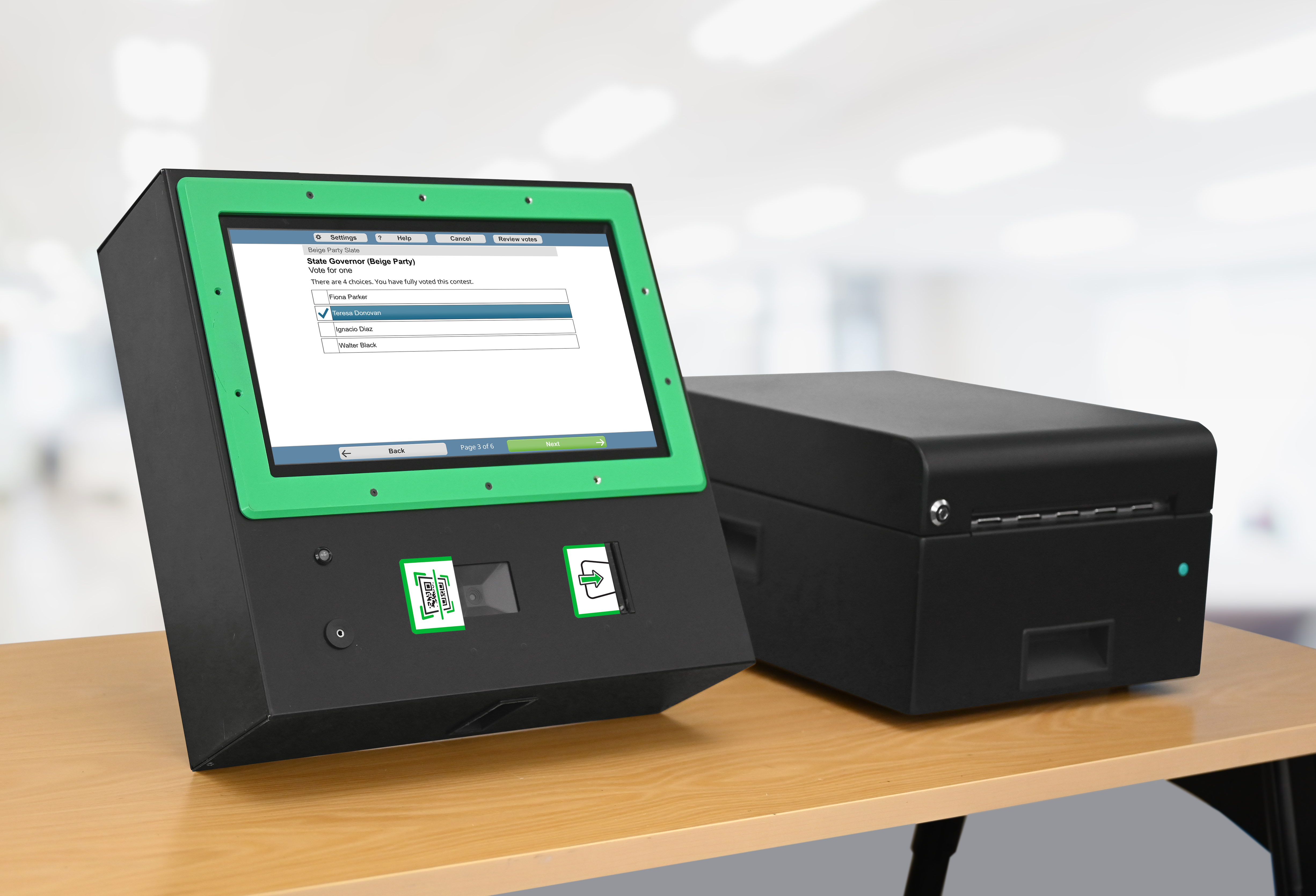 ClearMark and Printer in Room Touchscreen voting machine with neon green frame and black base rests on wood table. White screen displays mock State Governor contest. To right of machine is small black printer.
